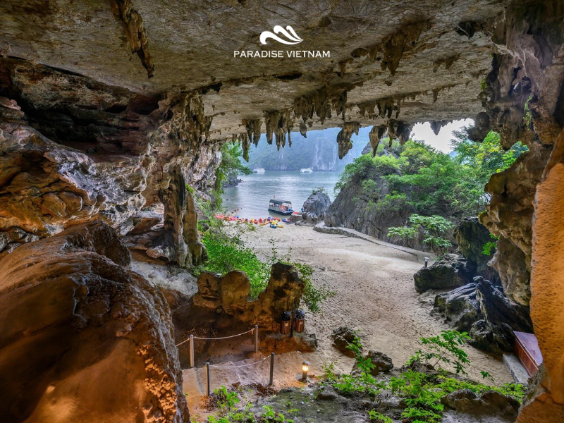 The surrounding waters are calm and clear, making kayaking near Trinh Nu Cave smooth and enjoyable